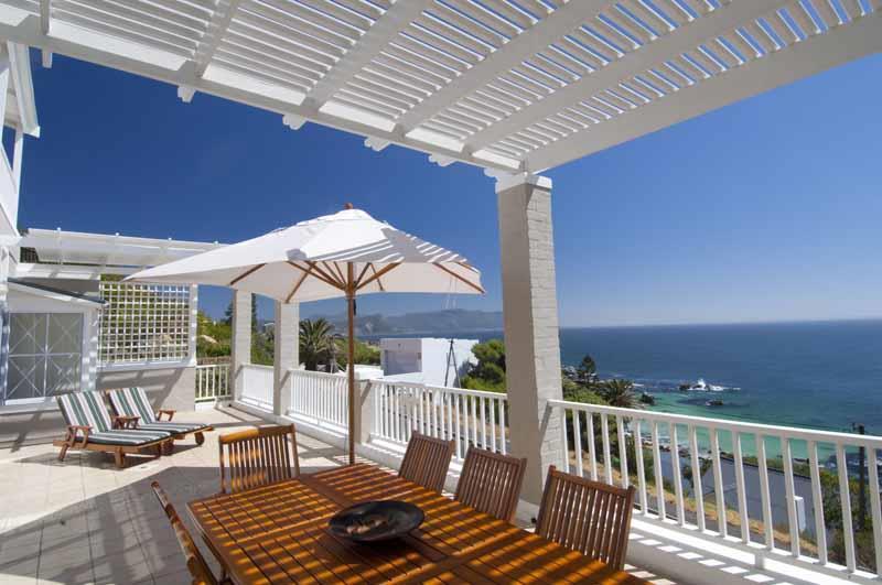 Leisure The sea-facing patio with deckchairs, sun umbrella and outdoor dining is perfect for morning coffee and sipping on a Cape Wine at sunset.