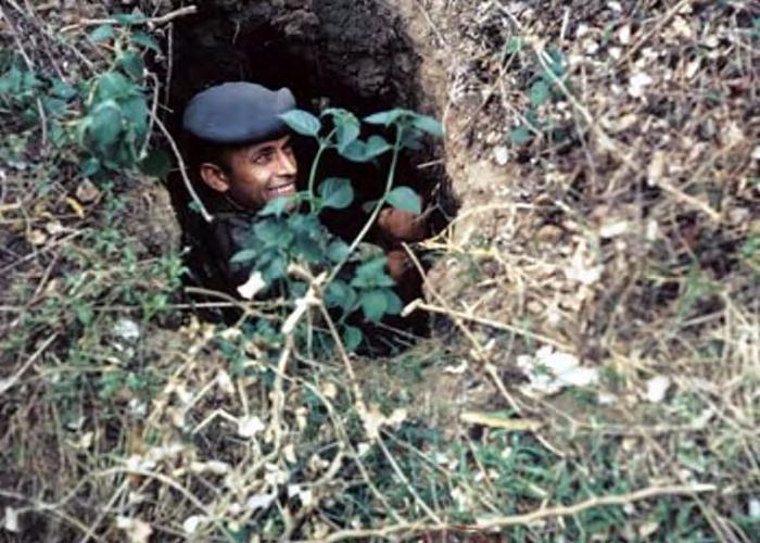 3.22_13 - Operational Test Phase: Viet Cong Tunnels. MSgt. Bob Hockanson emerging from VC tunnel after placing explosive charge - January 1967. (Photos Courtesy: CMSgt.