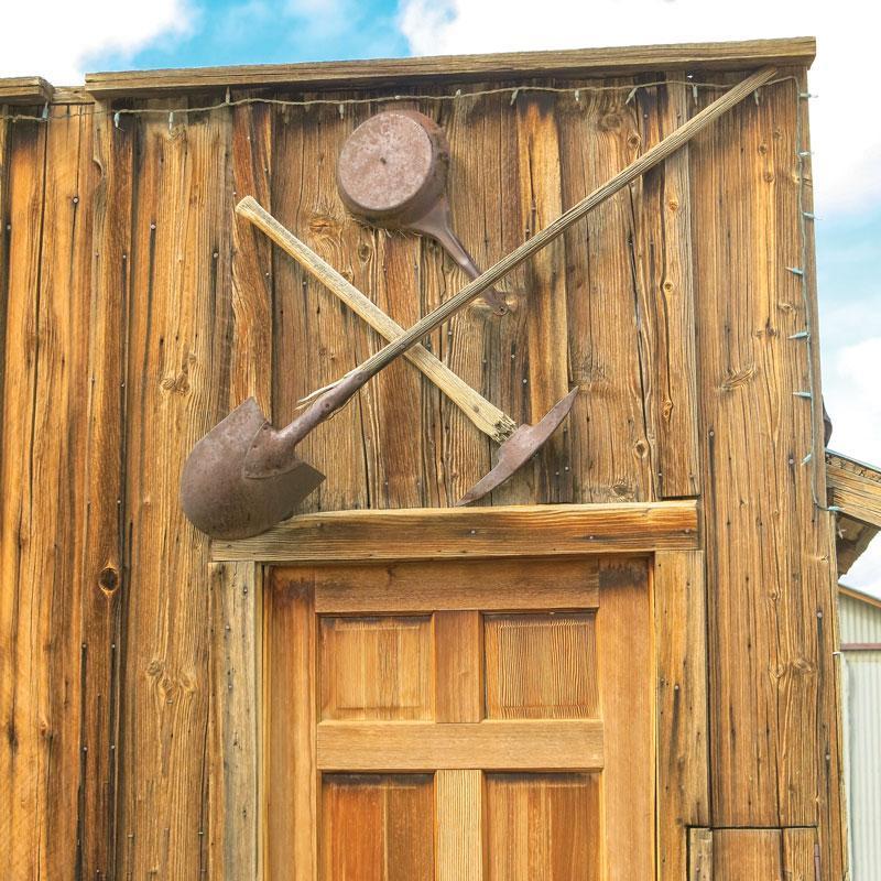 The old mining tools are above the front door of this refurbished cabin in Gold Point, which is available for rent.