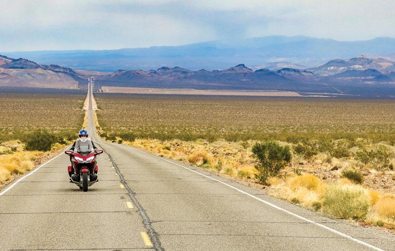 Nevada s road engineers have often had a simplified, and economical, approach to building highways straight lines. Though most motorcyclists appreciate a few curves.