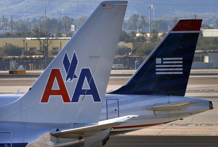 The deal merging American Airlines and US Airways is expected to close in September.