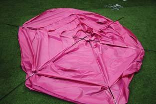 trampoline tent roof. Firstly lay out the fibreglass rods as shown to the left.