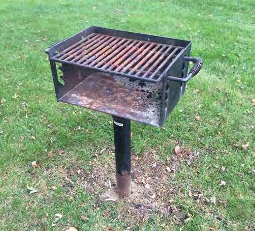 Rusted grill at Crestview Park seating
