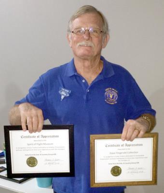 President Tom Webb holding two of the three Appreciation