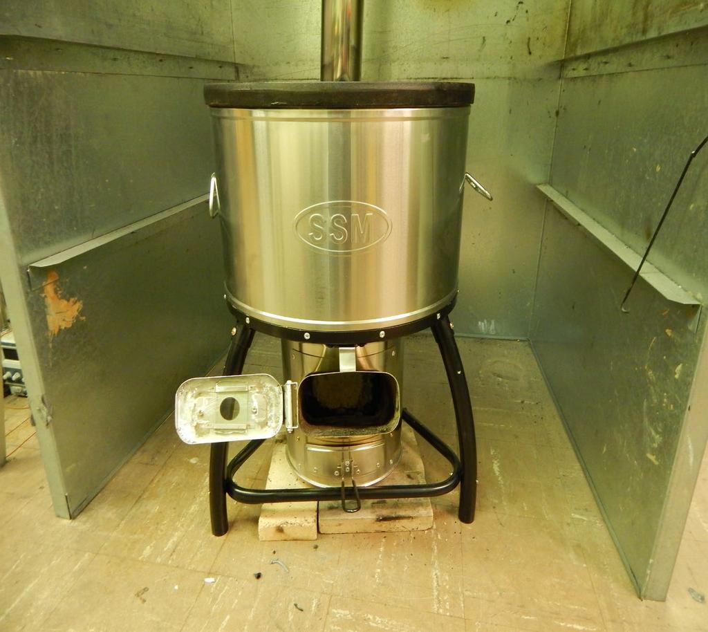 Forced draft mixing and metering are used in pellet burning heating stoves.