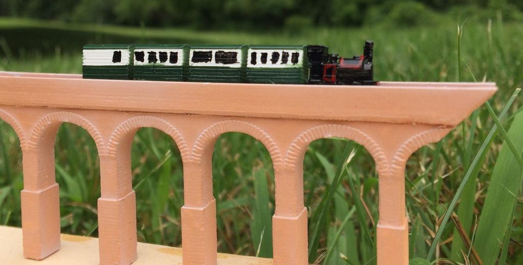 Both the bridge and the train are 3D printed and as a result are