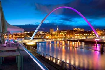 Tyne, including the Tyne Bridge and the beautifully lit Gateshead Millennium Bridge.