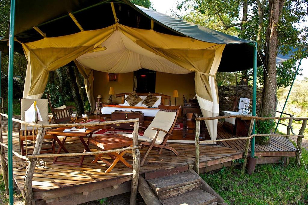 Mara Intrepids Camp The Crown of the Mara: Mara Intrepids is a short drive from the Mara River, where more than a million wildebeest and zebra make their perilous migration crossing every May and