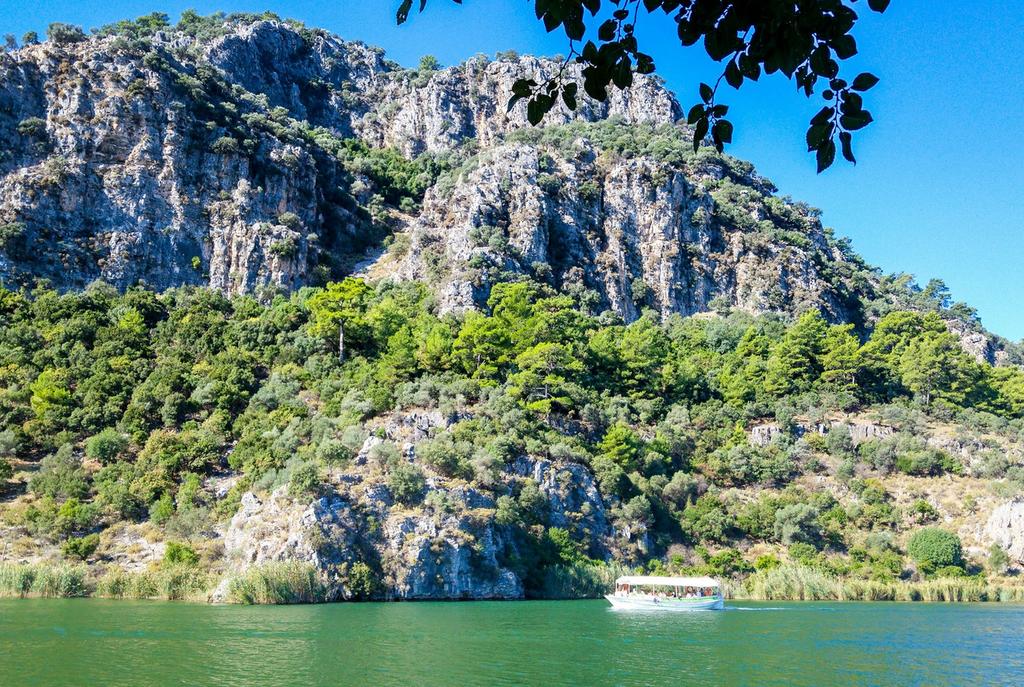 4 Dalyan River A N C I E N T A R T <p>your charter yacht will anchor near the mouth of the Dalyan River, where a local guide boat will meet you.