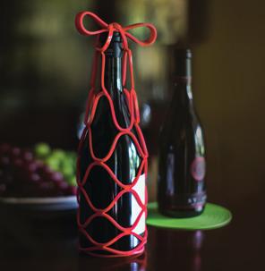 Expandable bottle tote perfect to carry your wine or to give as a gift.