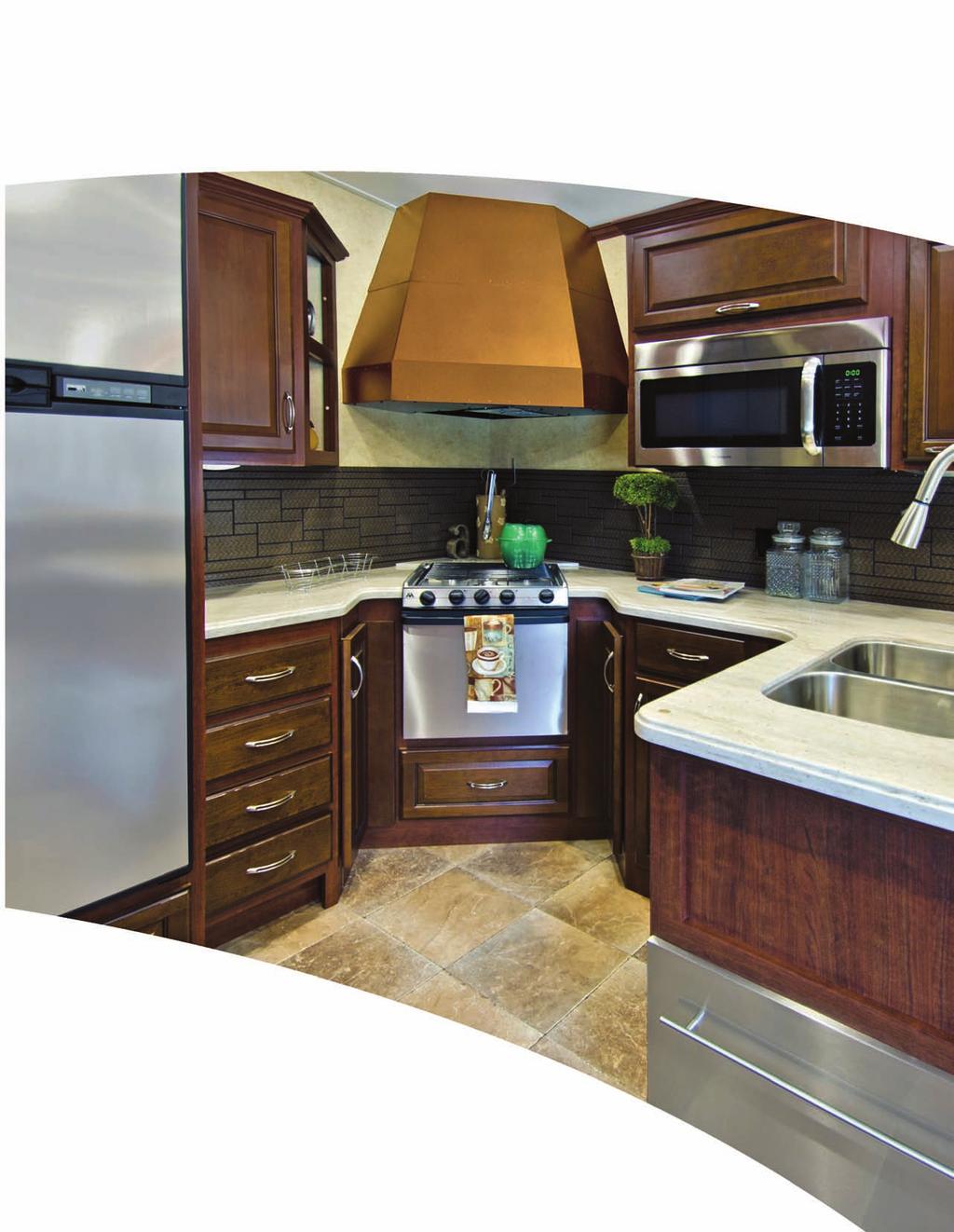 With the double door refrigerator/freezer, microwave and three-burner range with oven