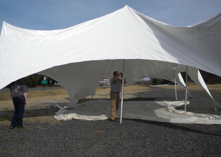 Raise the poles with a slight bottom angle toward the center of the tent. Push the poles out until the canopy is taut.
