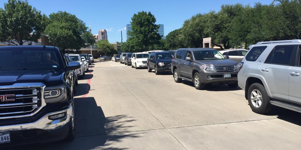 Generally, the parents line up inside the campus in two lines leaving the middle lane open for vehicles