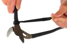 Apply tape to cinched lanyard in a