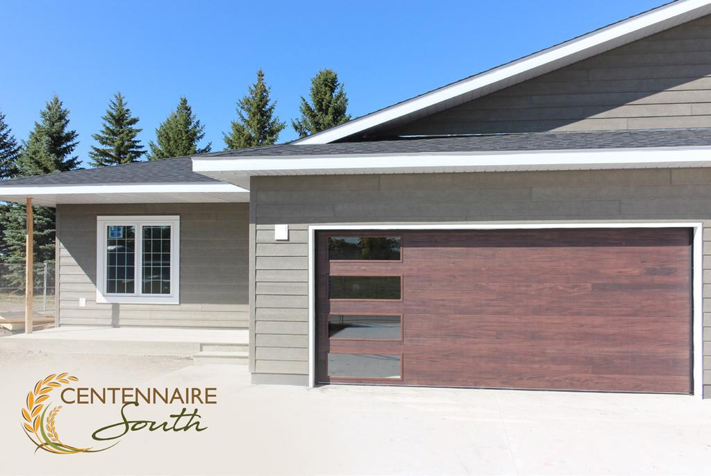 Most of the exterior work, including siding and roofing is complete and the attached two car garage (pictured above) is ready for colder weather!